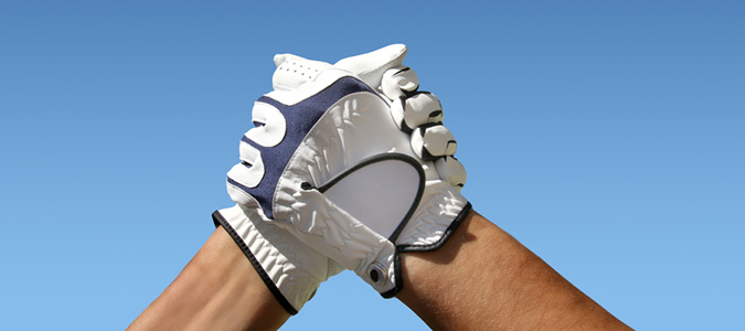 German Golf Academy Golfkurse Golfer die sich die Hand geben